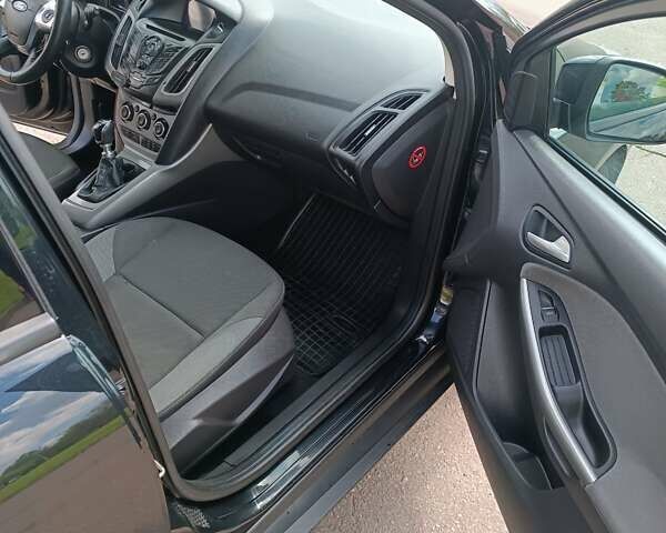 Черный Форд Фокус, объемом двигателя 1.6 л и пробегом 365 тыс. км за 6500 $, фото 15 на Automoto.ua