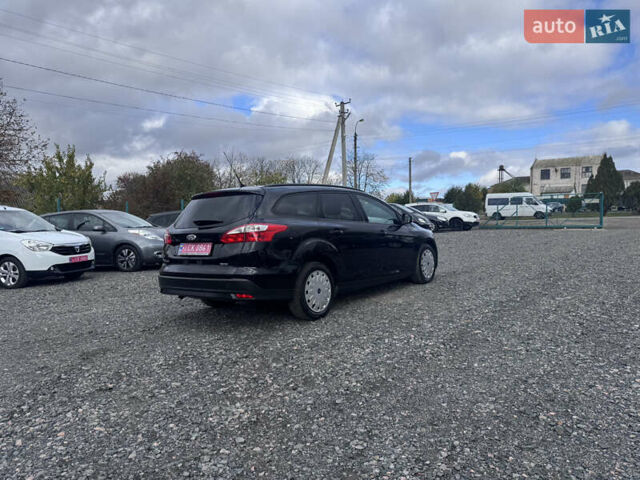 Черный Форд Фокус, объемом двигателя 1.6 л и пробегом 195 тыс. км за 7590 $, фото 22 на Automoto.ua