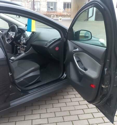 Черный Форд Фокус, объемом двигателя 1.56 л и пробегом 235 тыс. км за 7800 $, фото 9 на Automoto.ua