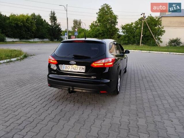 Черный Форд Фокус, объемом двигателя 1.6 л и пробегом 264 тыс. км за 8099 $, фото 1 на Automoto.ua