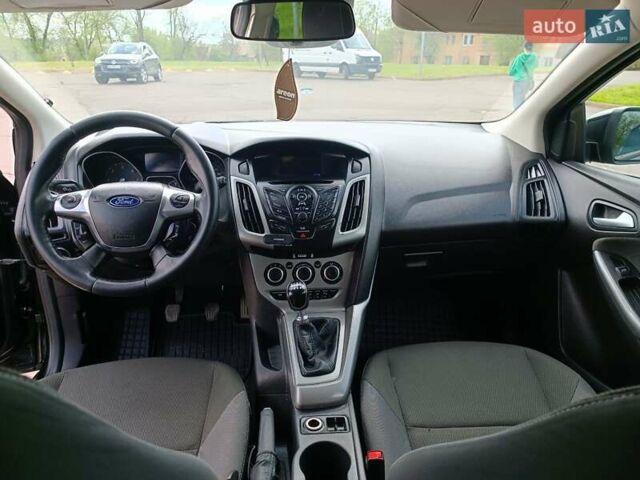 Черный Форд Фокус, объемом двигателя 1.6 л и пробегом 365 тыс. км за 6500 $, фото 16 на Automoto.ua