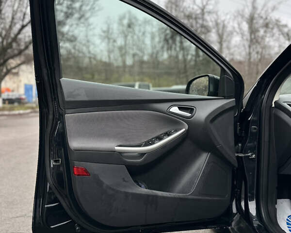 Чорний Форд Фокус, об'ємом двигуна 1.6 л та пробігом 269 тис. км за 6950 $, фото 6 на Automoto.ua