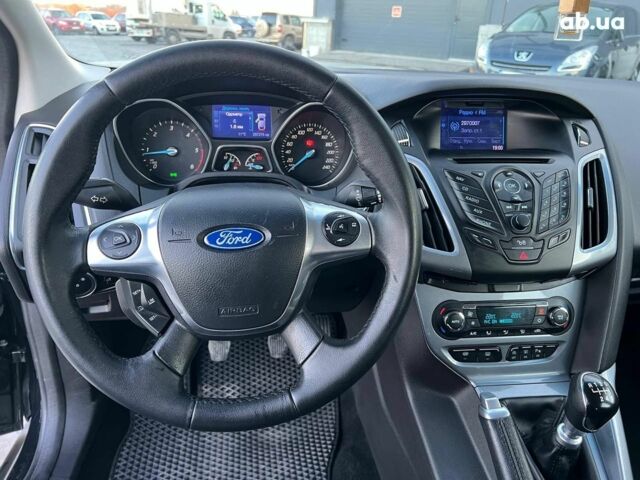 Чорний Форд Фокус, об'ємом двигуна 1.6 л та пробігом 295 тис. км за 7890 $, фото 21 на Automoto.ua