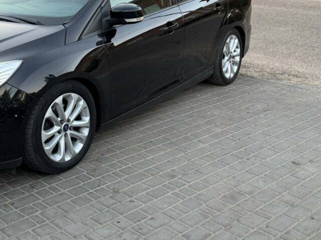 Черный Форд Фокус, объемом двигателя 1.6 л и пробегом 240 тыс. км за 7900 $, фото 1 на Automoto.ua