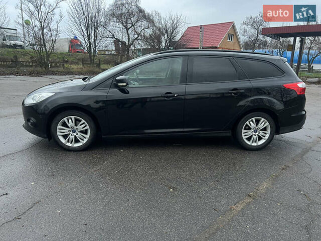Черный Форд Фокус, объемом двигателя 1.6 л и пробегом 180 тыс. км за 7400 $, фото 1 на Automoto.ua