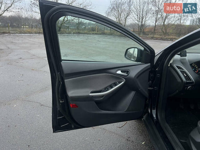 Черный Форд Фокус, объемом двигателя 1.6 л и пробегом 180 тыс. км за 7400 $, фото 9 на Automoto.ua