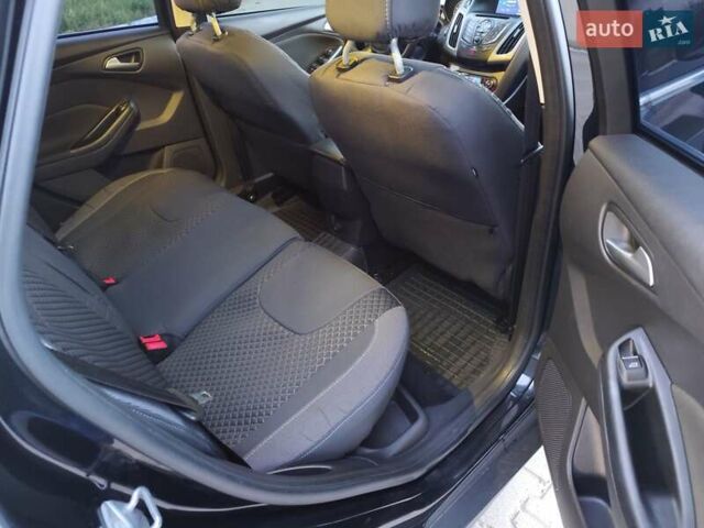 Черный Форд Фокус, объемом двигателя 1.6 л и пробегом 264 тыс. км за 8099 $, фото 8 на Automoto.ua