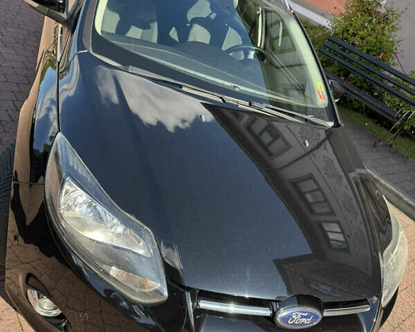 Чорний Форд Фокус, об'ємом двигуна 1.6 л та пробігом 227 тис. км за 8299 $, фото 77 на Automoto.ua