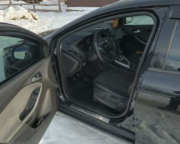 Чорний Форд Фокус, об'ємом двигуна 1.6 л та пробігом 319 тис. км за 7700 $, фото 9 на Automoto.ua