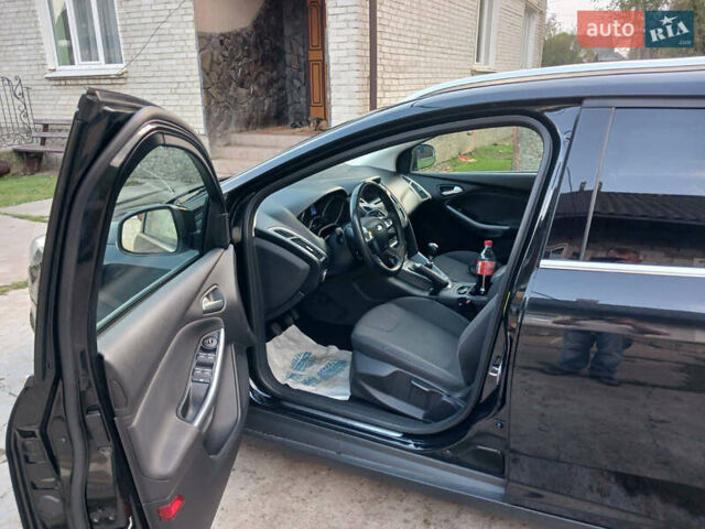 Черный Форд Фокус, объемом двигателя 1.56 л и пробегом 240 тыс. км за 7700 $, фото 3 на Automoto.ua
