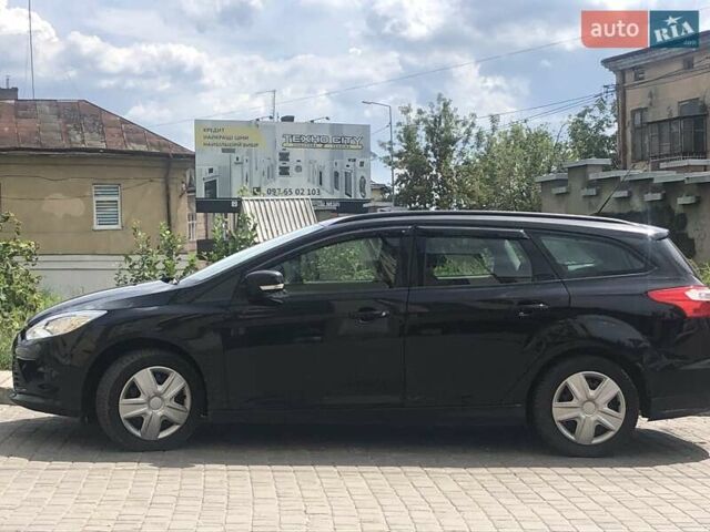 Черный Форд Фокус, объемом двигателя 1.6 л и пробегом 214 тыс. км за 8200 $, фото 3 на Automoto.ua