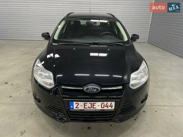 Черный Форд Фокус, объемом двигателя 1.6 л и пробегом 211 тыс. км за 7750 $, фото 6 на Automoto.ua