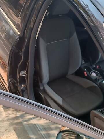 Черный Форд Фокус, объемом двигателя 1.6 л и пробегом 365 тыс. км за 6500 $, фото 2 на Automoto.ua