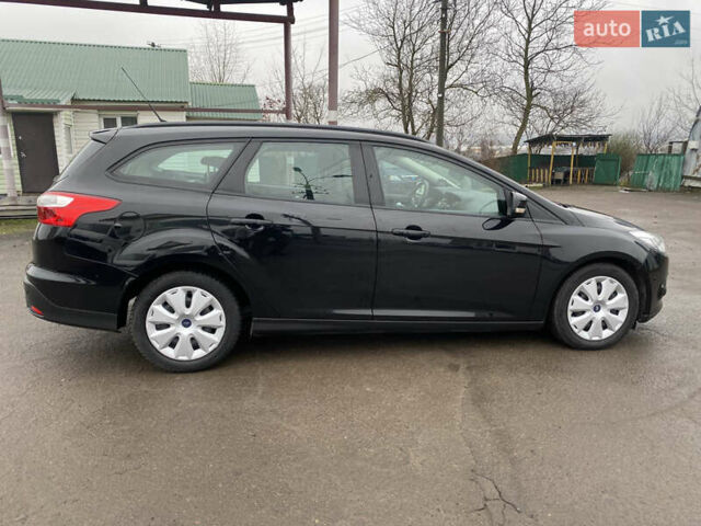 Чорний Форд Фокус, об'ємом двигуна 1.6 л та пробігом 225 тис. км за 7790 $, фото 9 на Automoto.ua
