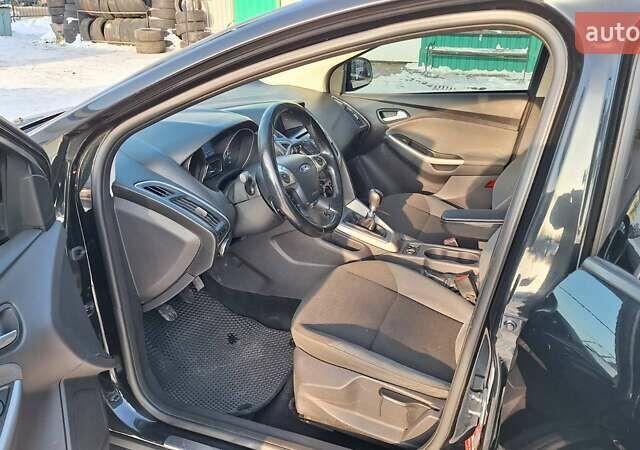 Чорний Форд Фокус, об'ємом двигуна 1.6 л та пробігом 282 тис. км за 6950 $, фото 6 на Automoto.ua