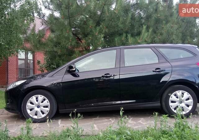 Черный Форд Фокус, объемом двигателя 1.6 л и пробегом 177 тыс. км за 7600 $, фото 1 на Automoto.ua