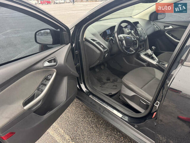 Черный Форд Фокус, объемом двигателя 1.6 л и пробегом 281 тыс. км за 7300 $, фото 12 на Automoto.ua