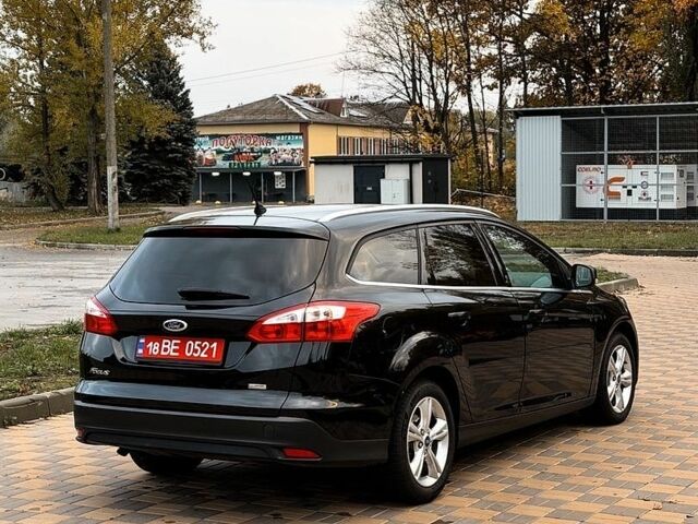 Чорний Форд Фокус, об'ємом двигуна 1.6 л та пробігом 224 тис. км за 8300 $, фото 4 на Automoto.ua