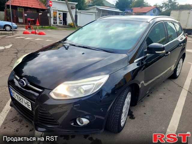 Черный Форд Фокус, объемом двигателя 1.6 л и пробегом 297 тыс. км за 7490 $, фото 1 на Automoto.ua