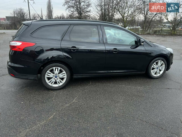 Черный Форд Фокус, объемом двигателя 1.6 л и пробегом 180 тыс. км за 7400 $, фото 6 на Automoto.ua