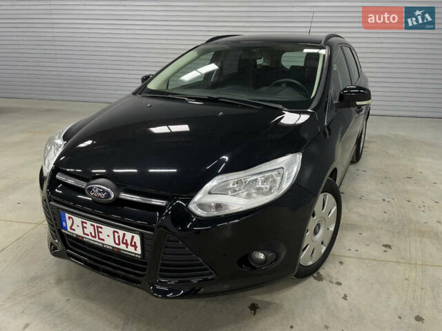 Черный Форд Фокус, объемом двигателя 1.6 л и пробегом 211 тыс. км за 7750 $, фото 1 на Automoto.ua