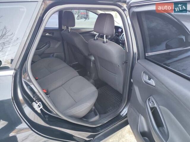 Черный Форд Фокус, объемом двигателя 1.6 л и пробегом 285 тыс. км за 7500 $, фото 11 на Automoto.ua