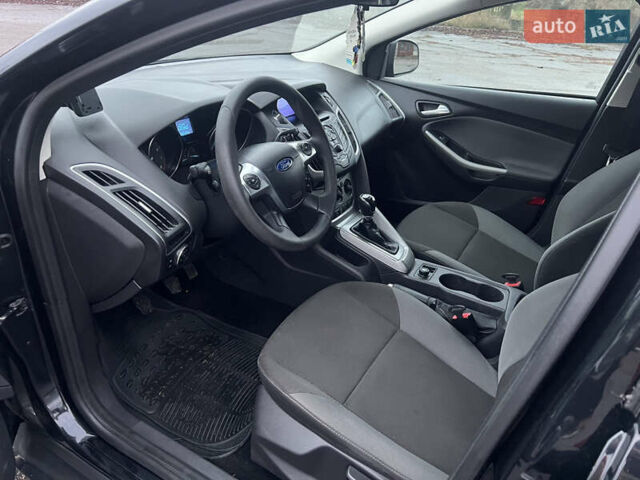 Черный Форд Фокус, объемом двигателя 1.6 л и пробегом 180 тыс. км за 7400 $, фото 13 на Automoto.ua