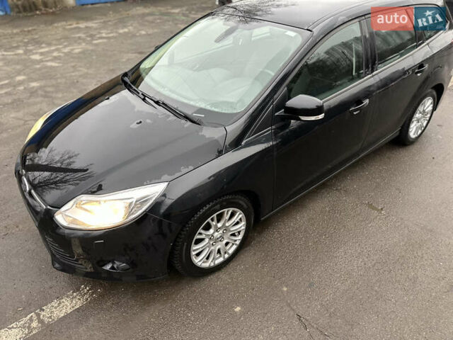 Чорний Форд Фокус, об'ємом двигуна 1.6 л та пробігом 269 тис. км за 6950 $, фото 65 на Automoto.ua