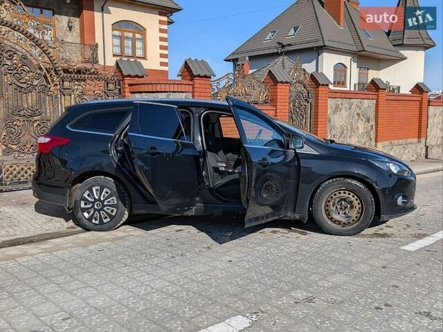 Черный Форд Фокус, объемом двигателя 1.6 л и пробегом 228 тыс. км за 7700 $, фото 9 на Automoto.ua