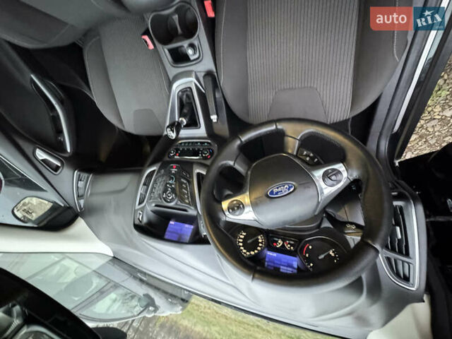 Чорний Форд Фокус, об'ємом двигуна 1.6 л та пробігом 227 тис. км за 8299 $, фото 8 на Automoto.ua