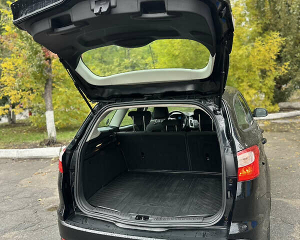 Чорний Форд Фокус, об'ємом двигуна 1.6 л та пробігом 269 тис. км за 6950 $, фото 14 на Automoto.ua