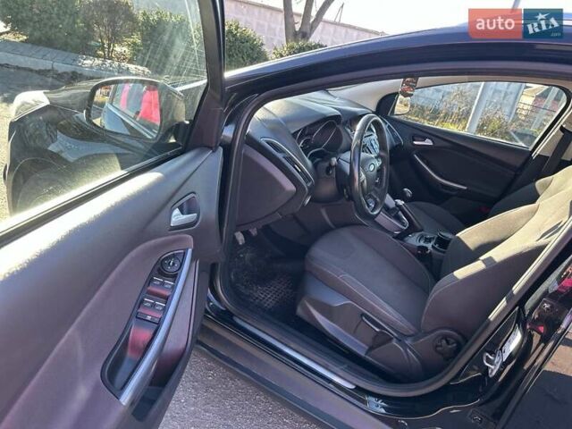 Чорний Форд Фокус, об'ємом двигуна 1.59 л та пробігом 229 тис. км за 8750 $, фото 11 на Automoto.ua