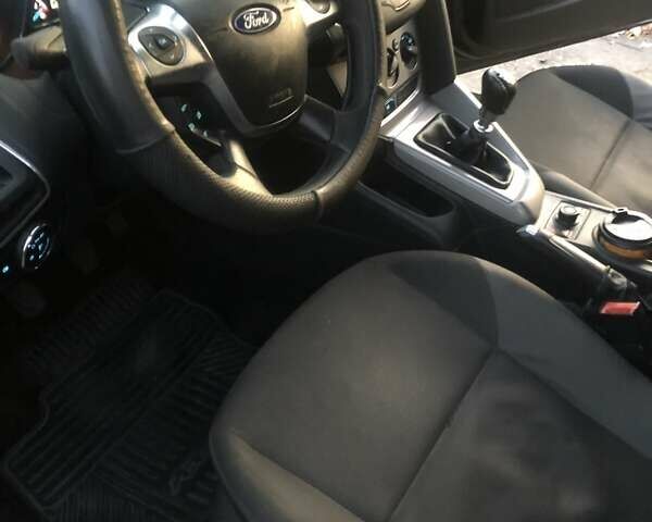 Черный Форд Фокус, объемом двигателя 1.6 л и пробегом 330 тыс. км за 7700 $, фото 12 на Automoto.ua