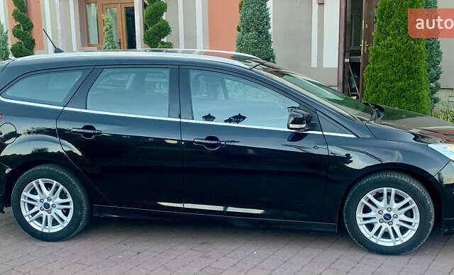 Форд Фокус 2013 у Стрые на Automoto.ua Чорний Форд Фокус, об'ємом двигуна 1.6 л та пробігом 219 тис. км за 9950 $, фото 11 на Automoto.ua