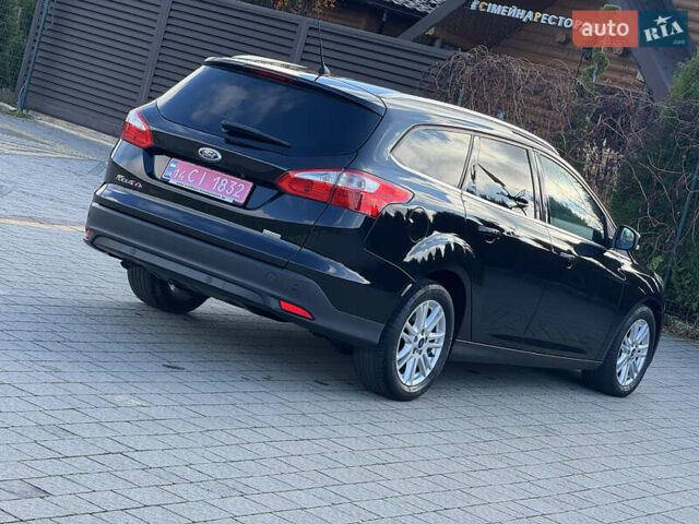Чорний Форд Фокус, об'ємом двигуна 1.6 л та пробігом 278 тис. км за 8599 $, фото 80 на Automoto.ua