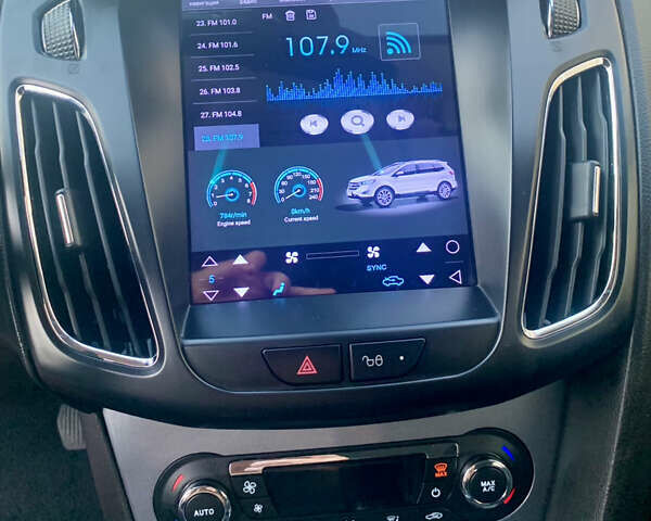 Форд Фокус 2013 у Стрые на Automoto.ua Чорний Форд Фокус, об'ємом двигуна 1.6 л та пробігом 219 тис. км за 9950 $, фото 47 на Automoto.ua