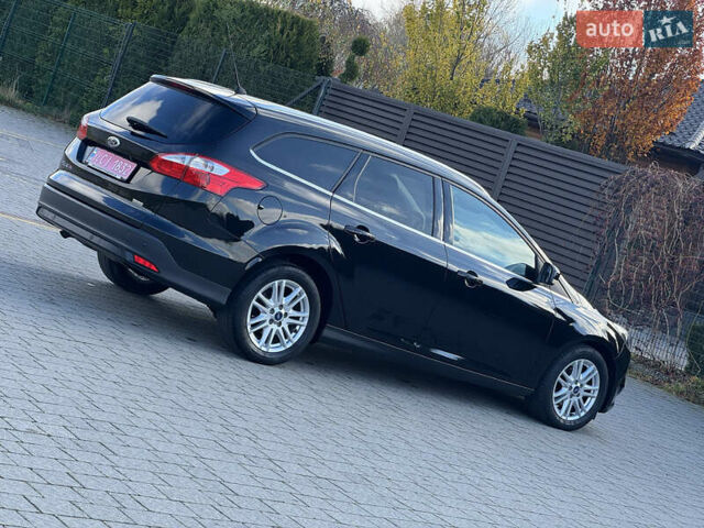 Чорний Форд Фокус, об'ємом двигуна 1.6 л та пробігом 278 тис. км за 8599 $, фото 76 на Automoto.ua