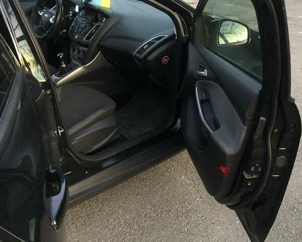 Черный Форд Фокус, объемом двигателя 1.6 л и пробегом 330 тыс. км за 7700 $, фото 21 на Automoto.ua