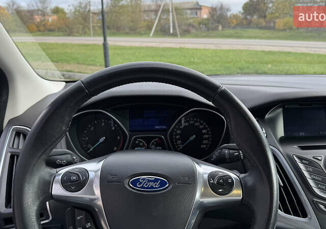 Чорний Форд Фокус, об'ємом двигуна 1.6 л та пробігом 265 тис. км за 9299 $, фото 24 на Automoto.ua