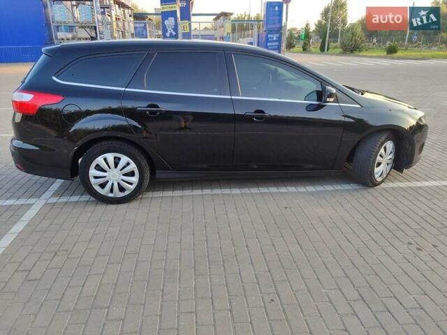 Черный Форд Фокус, объемом двигателя 1.6 л и пробегом 190 тыс. км за 8000 $, фото 2 на Automoto.ua