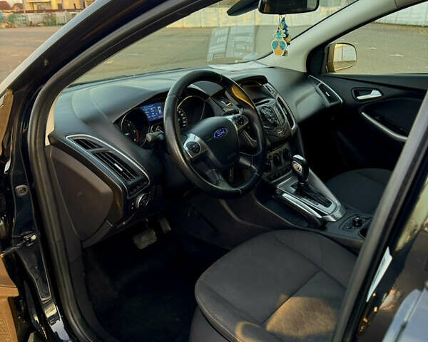 Черный Форд Фокус, объемом двигателя 2 л и пробегом 183 тыс. км за 8800 $, фото 9 на Automoto.ua