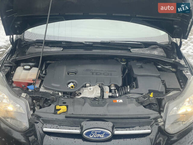 Черный Форд Фокус, объемом двигателя 1.6 л и пробегом 260 тыс. км за 7750 $, фото 12 на Automoto.ua