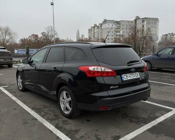 Черный Форд Фокус, объемом двигателя 2 л и пробегом 215 тыс. км за 7700 $, фото 2 на Automoto.ua