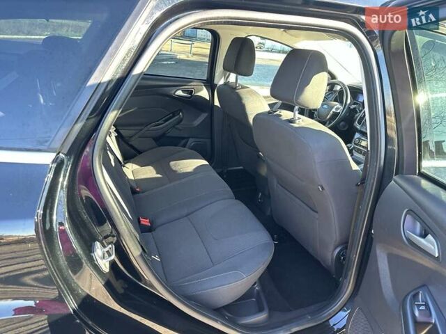 Чорний Форд Фокус, об'ємом двигуна 1.59 л та пробігом 229 тис. км за 8750 $, фото 15 на Automoto.ua