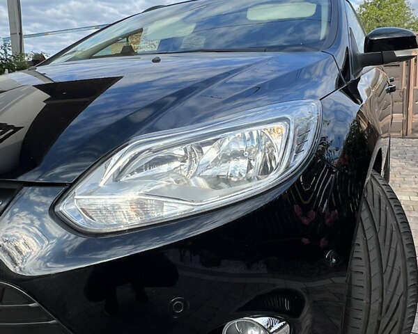 Чорний Форд Фокус, об'ємом двигуна 1.6 л та пробігом 214 тис. км за 8900 $, фото 16 на Automoto.ua