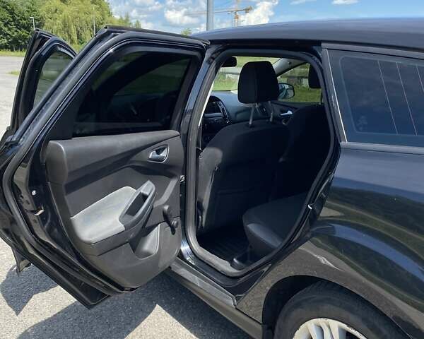 Черный Форд Фокус, объемом двигателя 1.6 л и пробегом 328 тыс. км за 6700 $, фото 11 на Automoto.ua