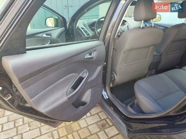 Форд Фокус 2013 в Радивилове на Automoto.ua Черный Форд Фокус, объемом двигателя 1.6 л и пробегом 260 тыс. км за 8650 $, фото 8 на Automoto.ua