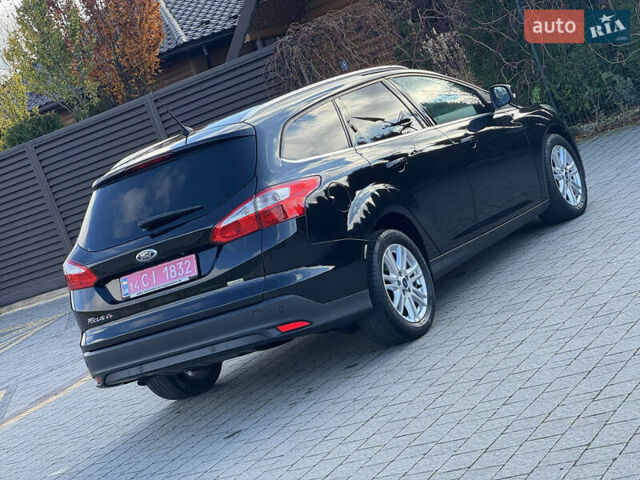 Чорний Форд Фокус, об'ємом двигуна 1.6 л та пробігом 278 тис. км за 8599 $, фото 79 на Automoto.ua