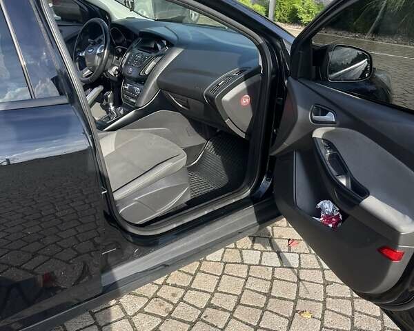 Чорний Форд Фокус, об'ємом двигуна 1.56 л та пробігом 319 тис. км за 7200 $, фото 6 на Automoto.ua