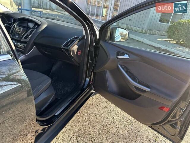 Чорний Форд Фокус, об'ємом двигуна 1.59 л та пробігом 229 тис. км за 8750 $, фото 12 на Automoto.ua